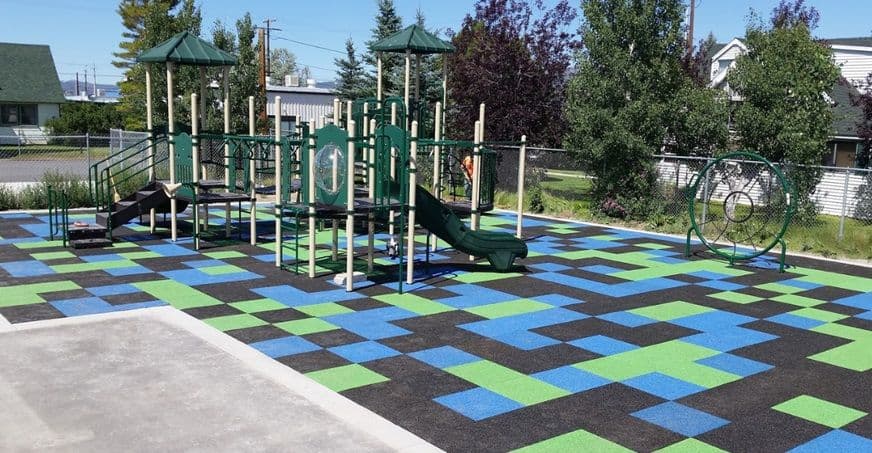Why is it recommended that public parks have Rubber Surfacing?