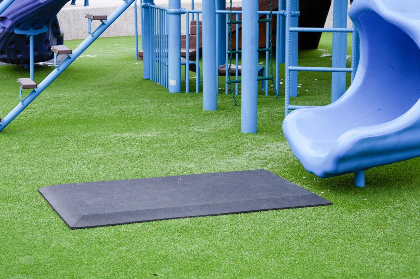 What is a slide-wear mat?